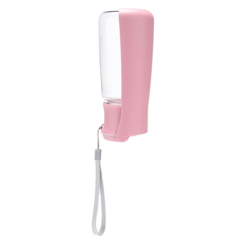 Pink foldable pet water bottle 550ml with built-in drinking dispenser